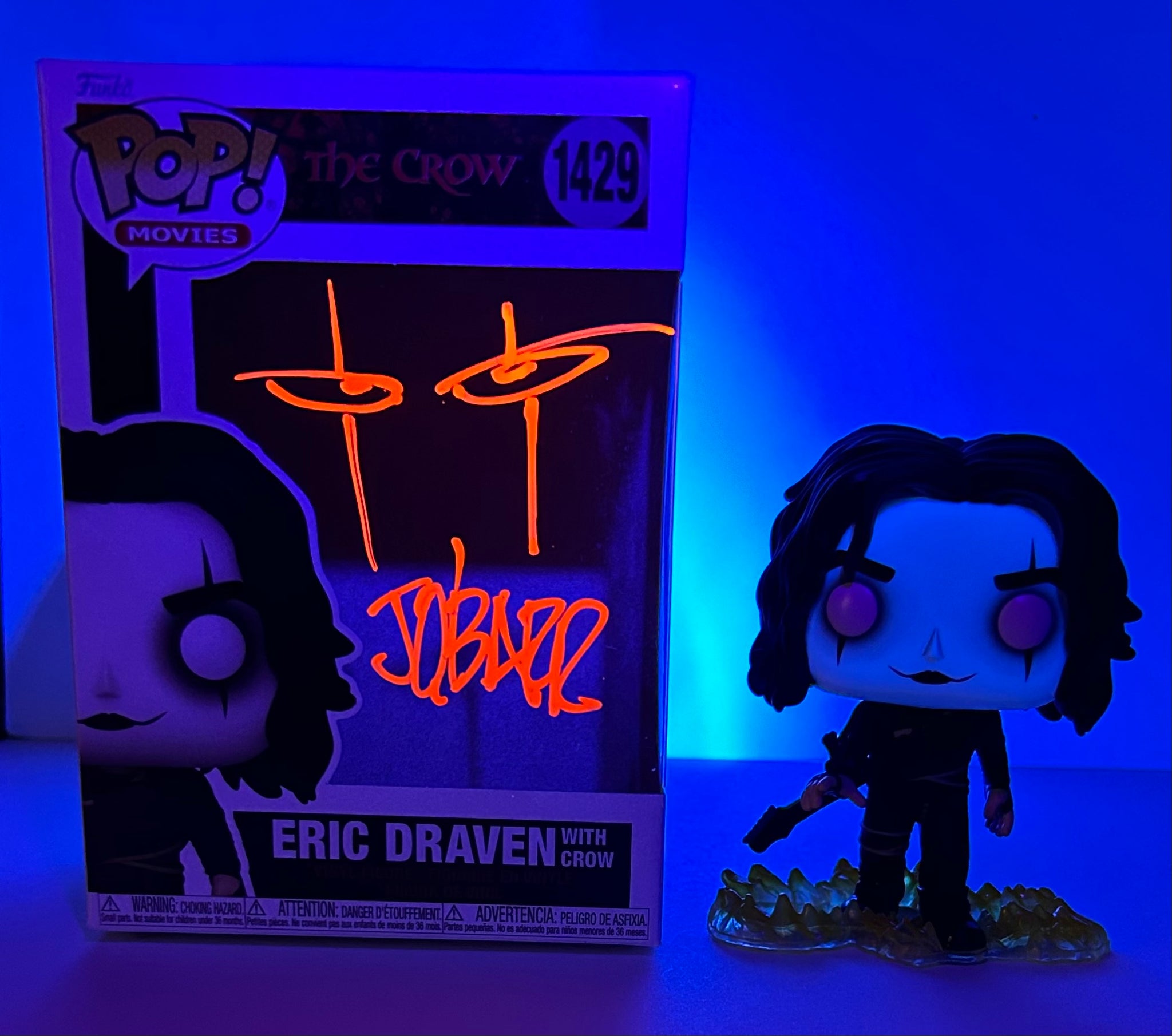 James O'Barr Signed Funko in blacklight