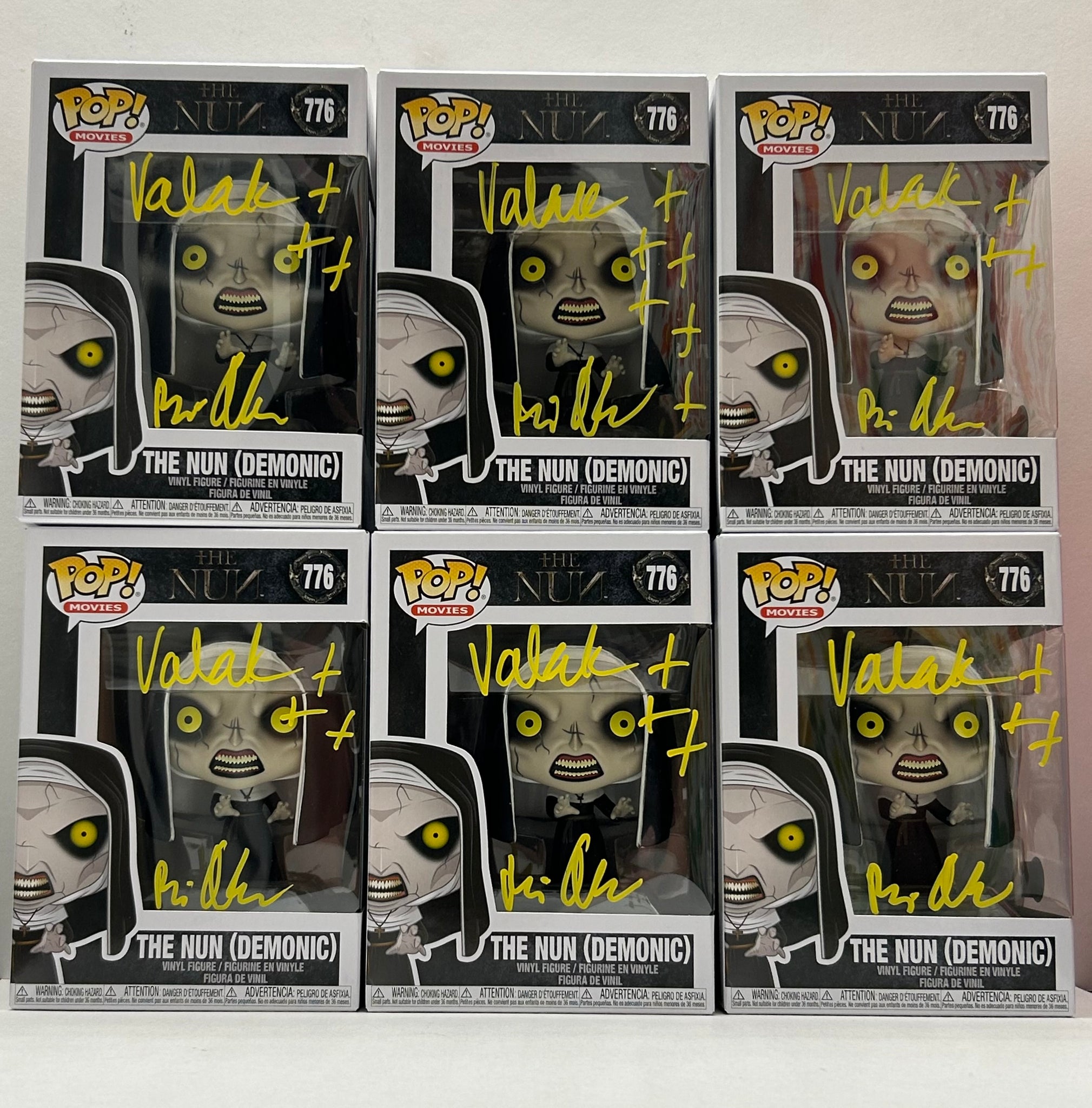 The Nun Funko POPs signed by Bonnie Aarons.