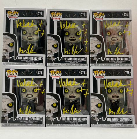 The Nun Funko POPs signed by Bonnie Aarons.